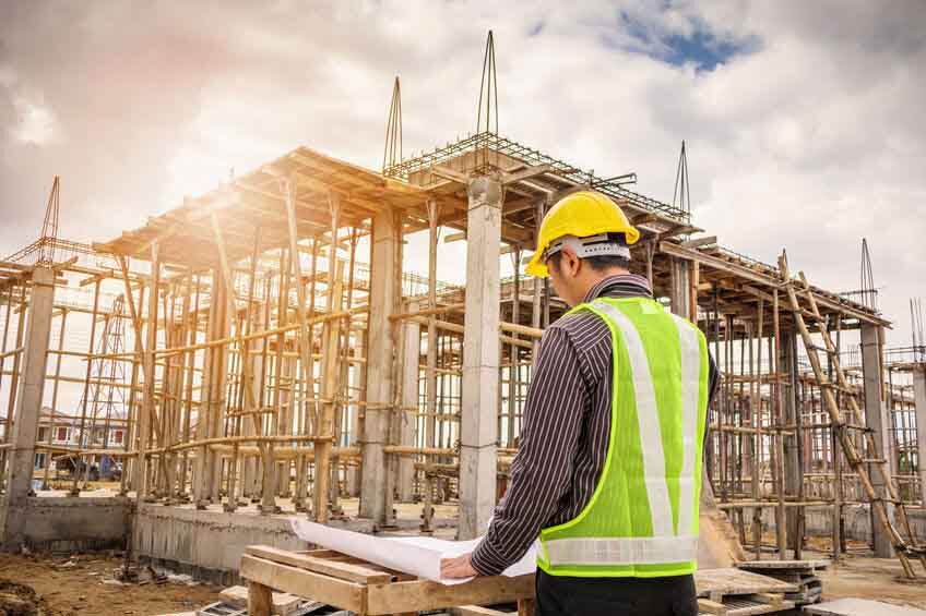 professional engineer worker at the house building construction site